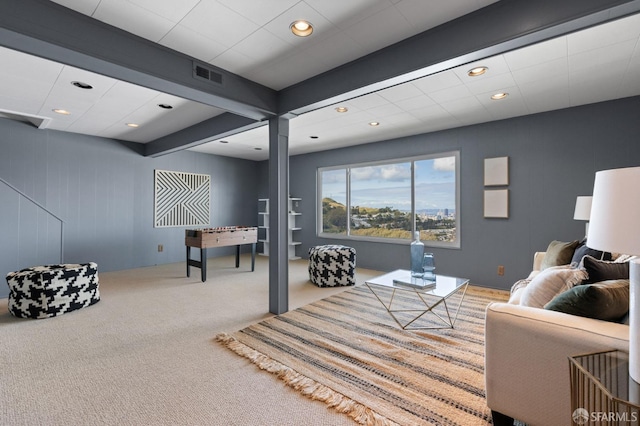 carpeted living room with beam ceiling, visible vents, and recessed lighting
