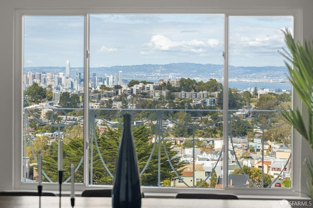 entryway featuring a view of city and a mountain view