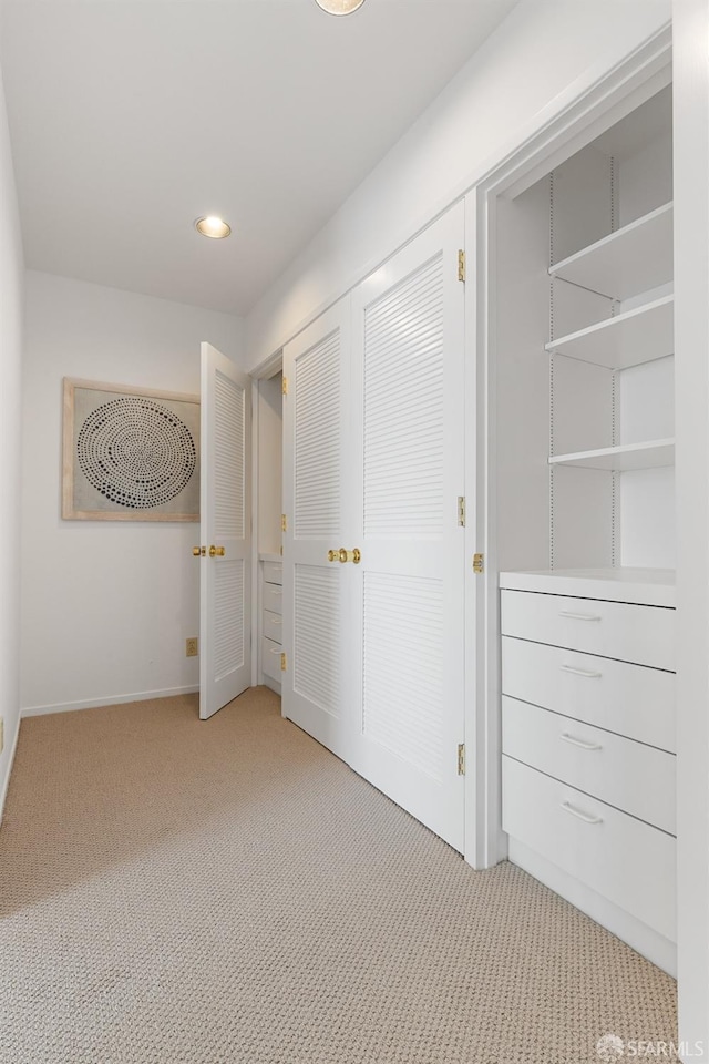 unfurnished bedroom with baseboards, recessed lighting, and carpet floors