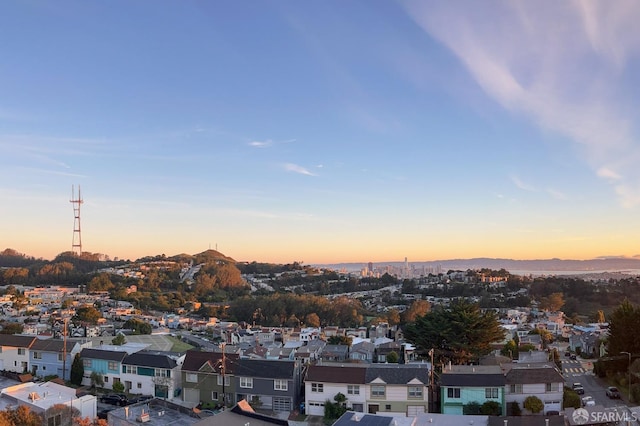 birds eye view of property featuring a residential view and a mountain view
