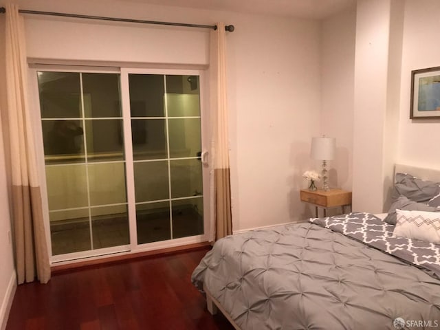 bedroom featuring wood-type flooring