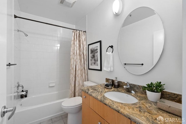 full bathroom with vanity, shower / bath combination with curtain, tile patterned floors, and toilet