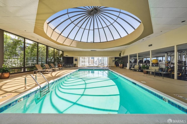 view of swimming pool with a patio