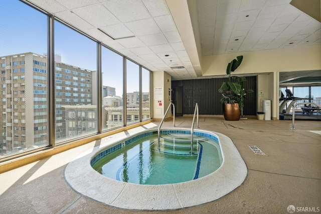 view of pool featuring an indoor hot tub