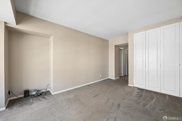 unfurnished bedroom with carpet