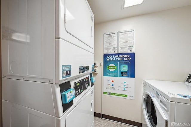 clothes washing area featuring stacked washing maching and dryer and independent washer and dryer