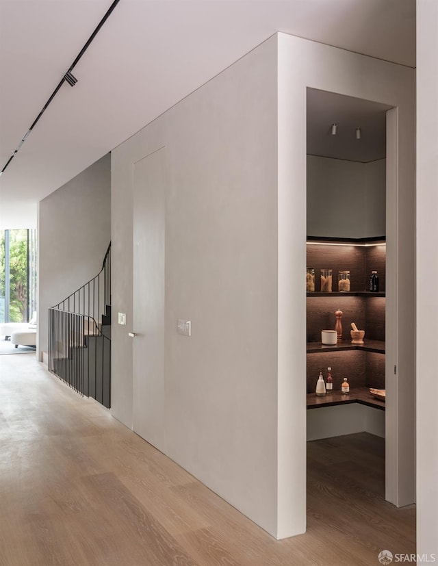 hallway featuring hardwood / wood-style floors