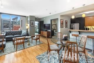 dining room featuring light wood finished floors