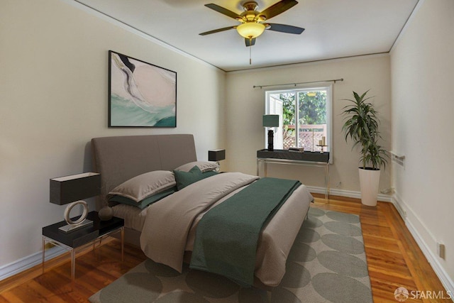 3675 Fillmore St Unit 102, San Francisco, CA 94123 - bedroom with wood finished floors, baseboards, and ceiling fan