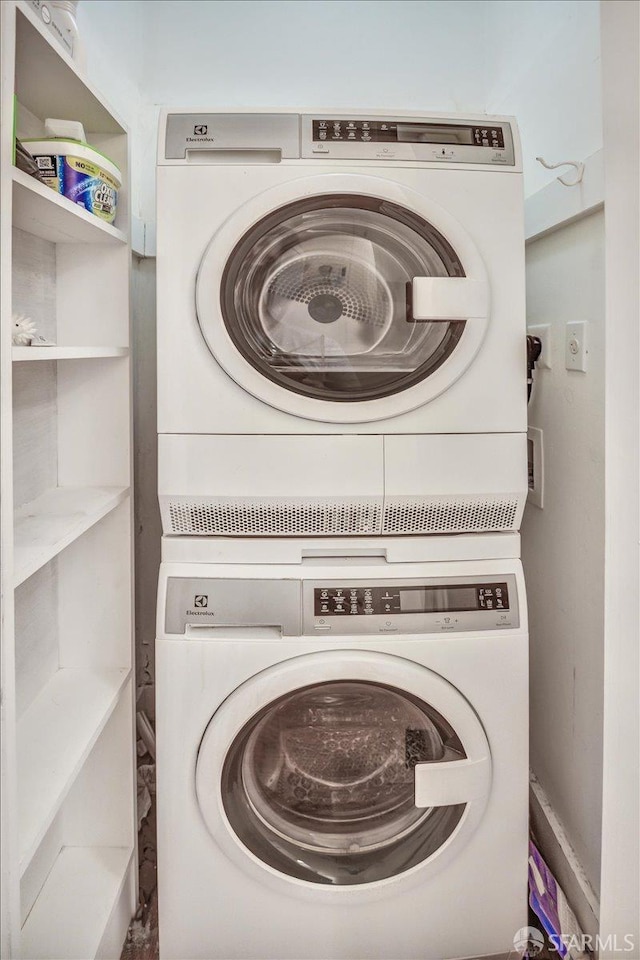 3675 Fillmore St Unit 102, San Francisco, CA 94123 - laundry area with stacked washer / drying machine