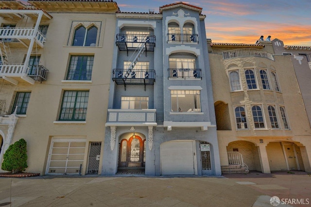 3675 Fillmore St Unit 102, San Francisco, CA 94123 - property at dusk with a garage
