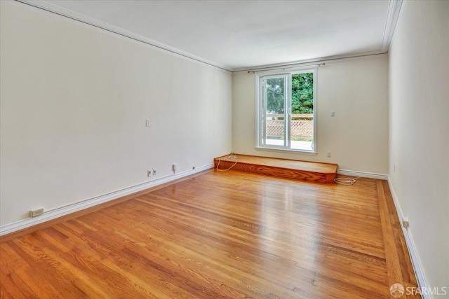3675 Fillmore St Unit 102, San Francisco, CA 94123 - spare room with ornamental molding, wood finished floors, and baseboards