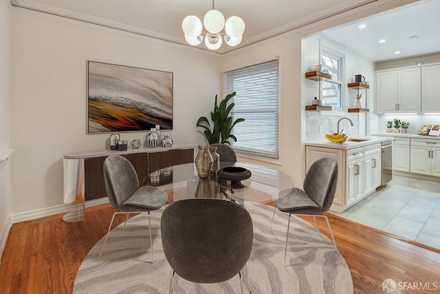 3675 Fillmore St Unit 102, San Francisco, CA 94123 - dining space featuring a chandelier, light wood-style flooring, baseboards, recessed lighting, and ornamental molding