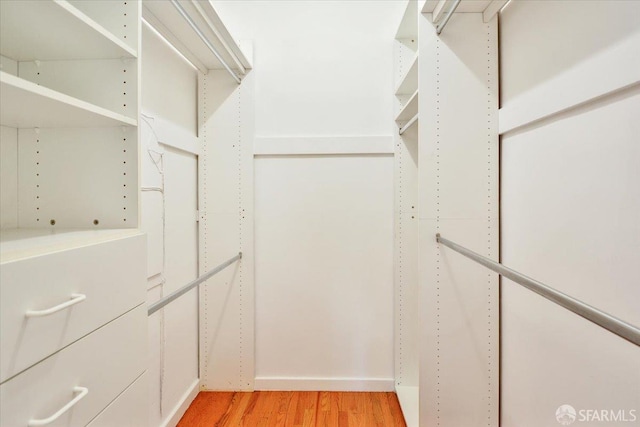3675 Fillmore St Unit 102, San Francisco, CA 94123 - spacious closet featuring light wood-style flooring
