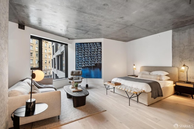 bedroom featuring light wood-type flooring