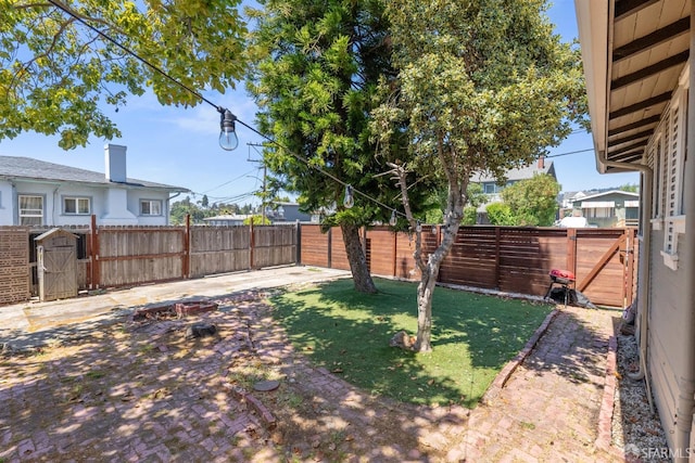2875 Sunset Ave, Oakland, CA 94601 - fenced backyard featuring a patio