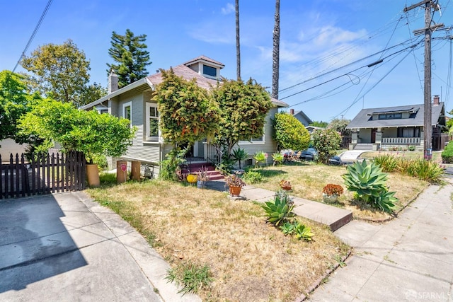 2875 Sunset Ave, Oakland, CA 94601 - view of front of house featuring a gate and a chimney