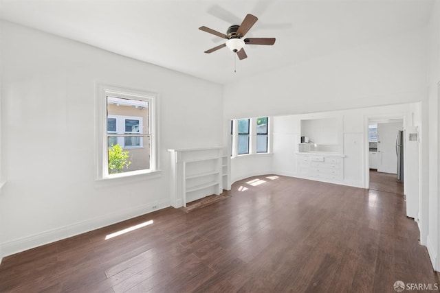 2875 Sunset Ave, Oakland, CA 94601 - unfurnished living room with dark wood finished floors, a ceiling fan, and baseboards