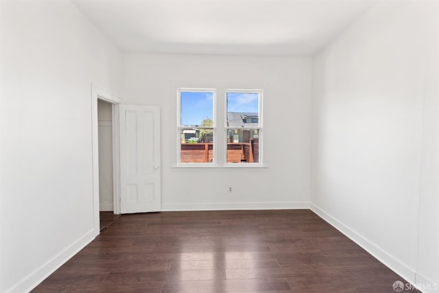 2875 Sunset Ave, Oakland, CA 94601 - unfurnished bedroom featuring dark wood-style flooring and baseboards