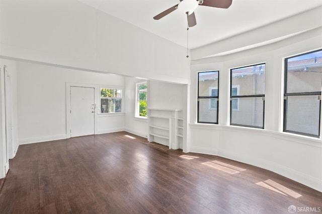 2875 Sunset Ave, Oakland, CA 94601 - unfurnished living room with ceiling fan, wood finished floors, and baseboards