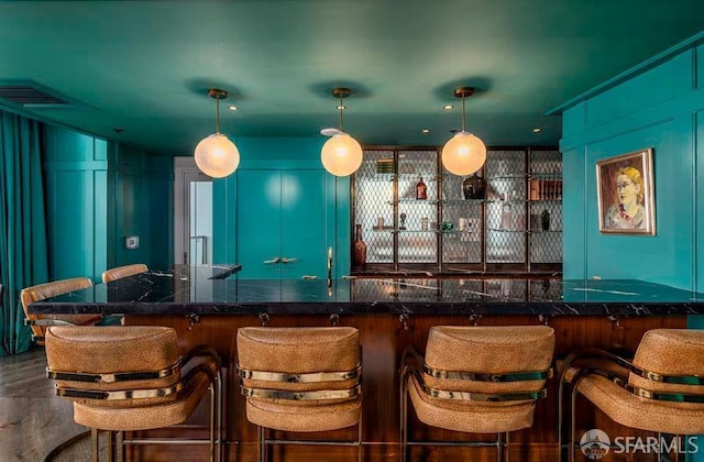 425 1st St Unit 3301, San Francisco, CA 94105 - indoor wet bar featuring a decorative wall and wood finished floors