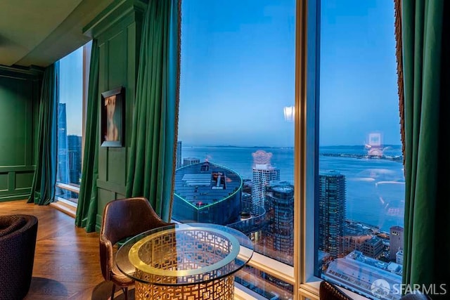 425 1st St Unit 3301, San Francisco, CA 94105 - living area featuring a water view, a view of city, and wood finished floors