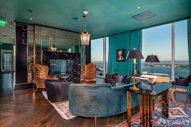425 1st St Unit 3301, San Francisco, CA 94105 - living room featuring floor to ceiling windows, a water view, and wood finished floors