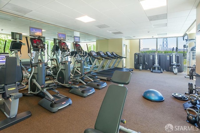 425 1st St Unit 3301, San Francisco, CA 94105 - exercise room with healthy amount of natural light, a drop ceiling, and a wall of windows