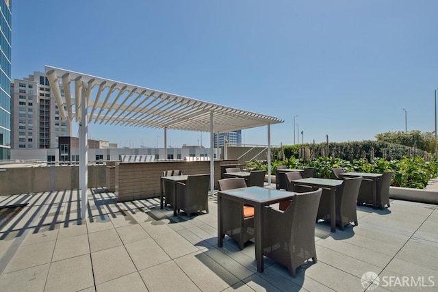 425 1st St Unit 3301, San Francisco, CA 94105 - view of patio with a pergola and outdoor dining space