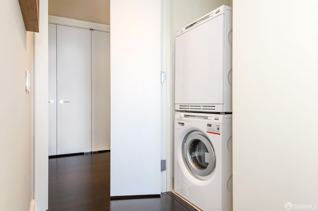 washroom with stacked washer / dryer