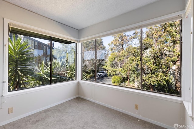 unfurnished sunroom with plenty of natural light