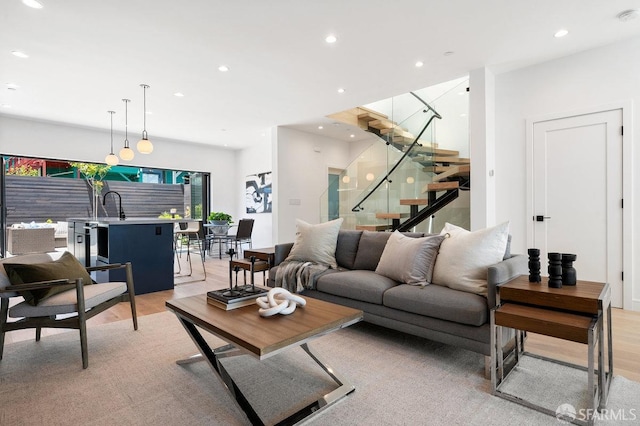 living room with light hardwood / wood-style floors