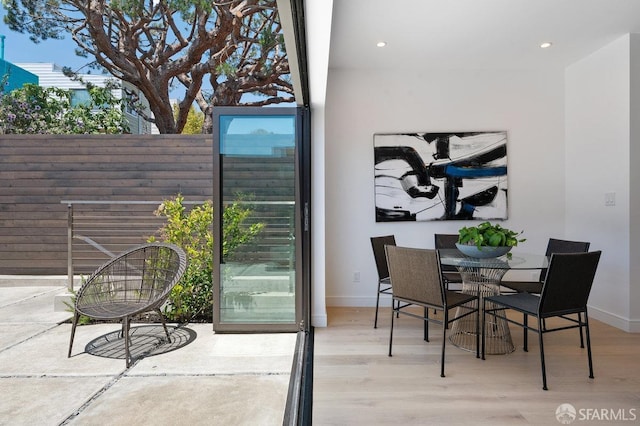 interior space with hardwood / wood-style flooring