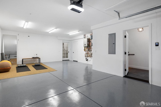 garage featuring electric panel and a garage door opener