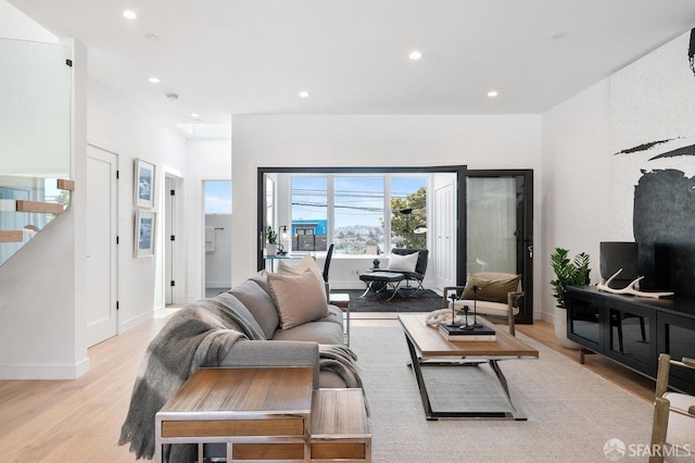 living room with light hardwood / wood-style floors