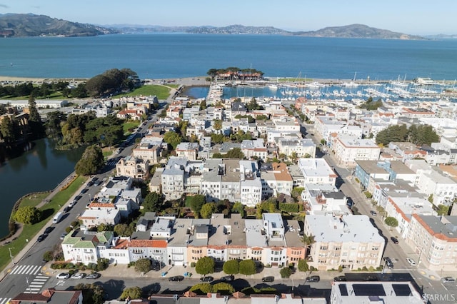 bird's eye view featuring a water and mountain view