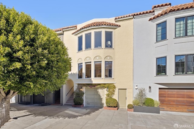 view of front of property featuring a garage