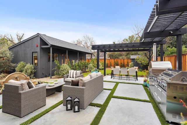 view of patio featuring exterior kitchen, outdoor lounge area, and a pergola