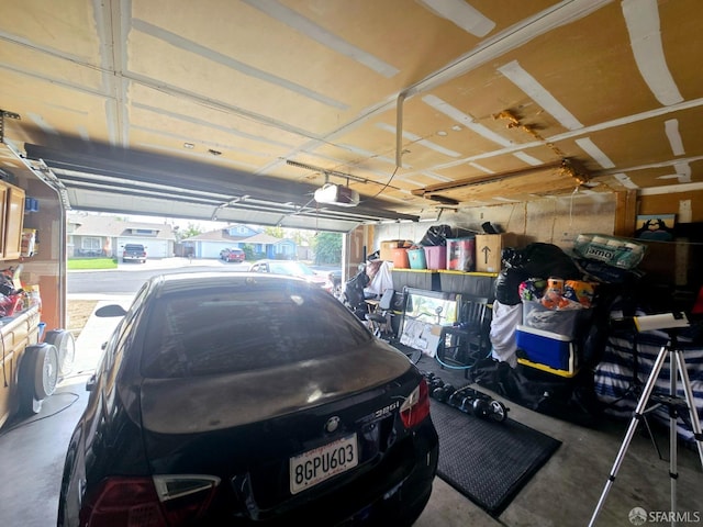 garage featuring a garage door opener