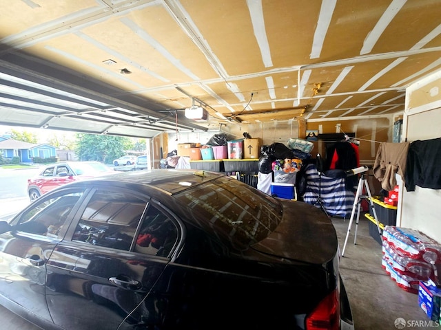 garage featuring a garage door opener