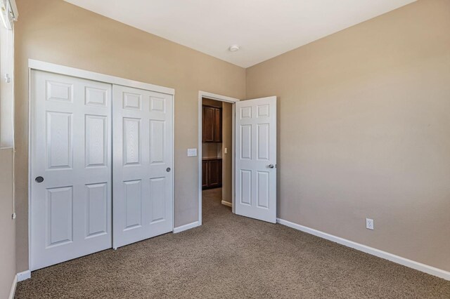 9877 Bluefin Way, Elk Grove, CA 95757 - unfurnished bedroom featuring carpet floors and a closet