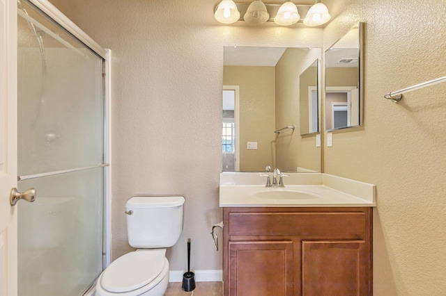 9877 Bluefin Way, Elk Grove, CA 95757 - bathroom featuring vanity, a shower stall, and a textured wall
