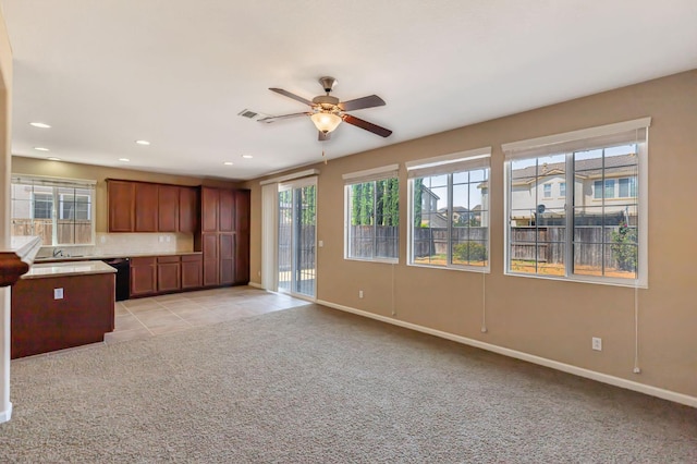 9877 Bluefin Way, Elk Grove, CA 95757 - kitchen with a ceiling fan, plenty of natural light, light carpet, recessed lighting, and dishwasher