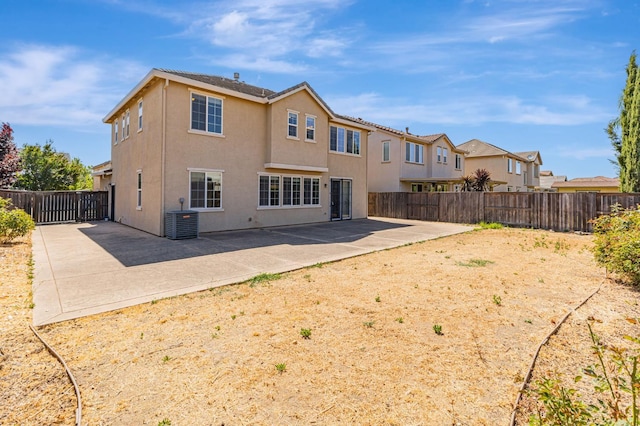 9877 Bluefin Way, Elk Grove, CA 95757 - back of house featuring a fenced backyard, a patio, and stucco siding