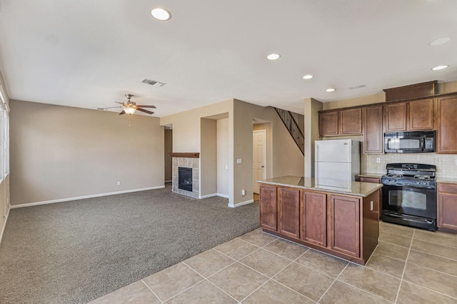 9877 Bluefin Way, Elk Grove, CA 95757 - kitchen with black appliances, light carpet, light tile patterned floors, ceiling fan, and backsplash
