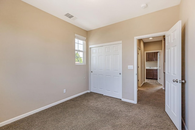 9877 Bluefin Way, Elk Grove, CA 95757 - unfurnished bedroom featuring carpet floors and a closet