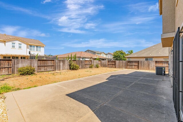 9877 Bluefin Way, Elk Grove, CA 95757 - fenced backyard with a residential view and a patio