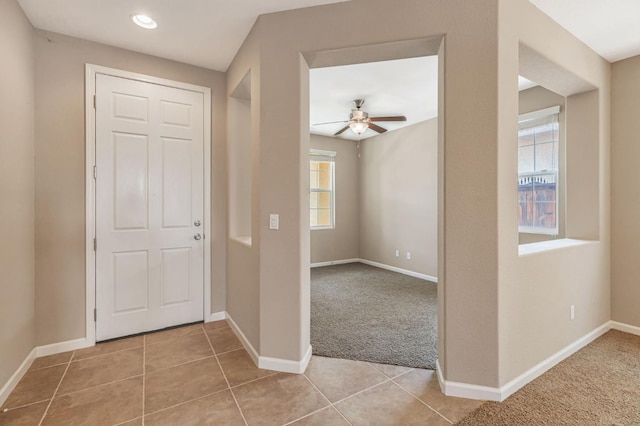 9877 Bluefin Way, Elk Grove, CA 95757 - entryway with a ceiling fan, light carpet, light tile patterned floors, and recessed lighting