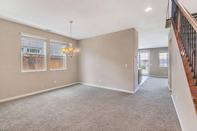 9877 Bluefin Way, Elk Grove, CA 95757 - empty room with stairs, carpet flooring, a chandelier, and recessed lighting