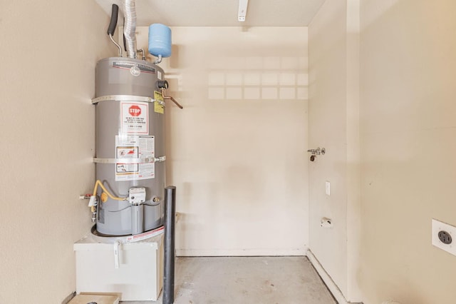 9877 Bluefin Way, Elk Grove, CA 95757 - utility room featuring strapped water heater